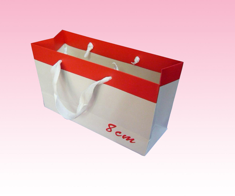 custom luxury paper gift bag factory with embossed red hot stamping logo