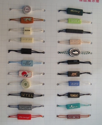 custom clothing sensor tags garment plastic hang tag with ribbon string supplier