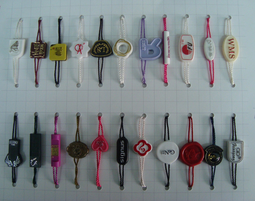 custom clothing sensor tags garment plastic hang tag with ribbon string supplier