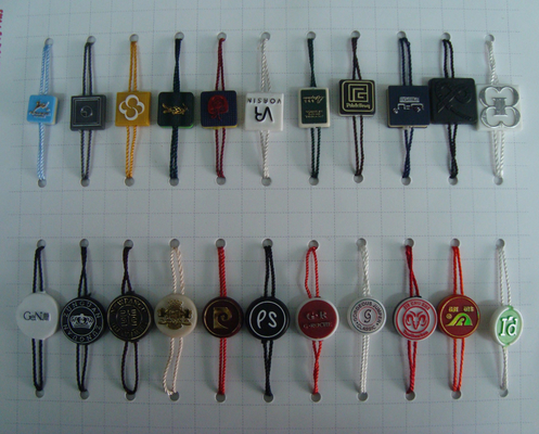 custom clothing sensor tags garment plastic hang tag with ribbon string supplier