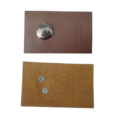 custom leather labels for hats garment leather tags wholesale with metal logo