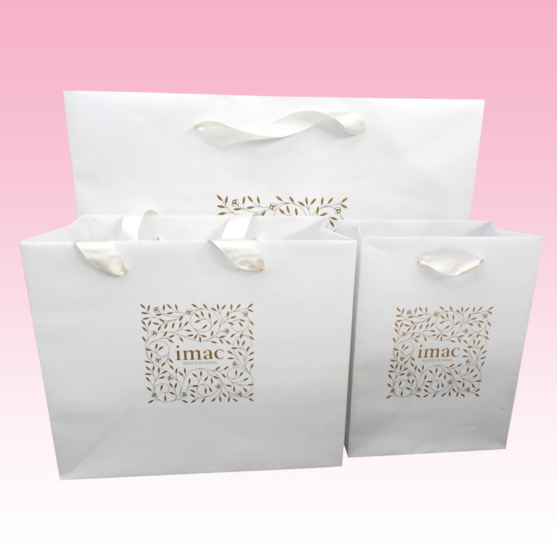 custom white paper gift bags manufacturer with 300gsm art paper